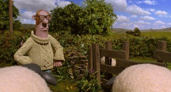 Movie still from “Shaun the Sheep Movie” (2015), directed by Mark Burton – A scene with a sheep and a man in a sweater; Wide shot, Over the shoulder angle