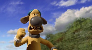 Movie still from “Shaun the Sheep Movie” (2015), directed by Mark Burton – A dog's face in front of a sky background; Close Up shot, Low angle