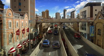 Movie still from “Shaun the Sheep Movie” (2015), directed by Mark Burton – An image of cars driving down the street; Extreme Wide shot, High angle