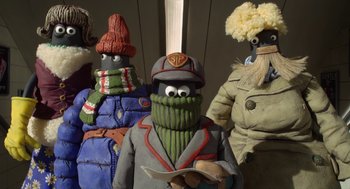 Movie still from “Shaun the Sheep Movie” (2015), directed by Mark Burton – A group of people dressed up like characters; Medium shot, Low angle
