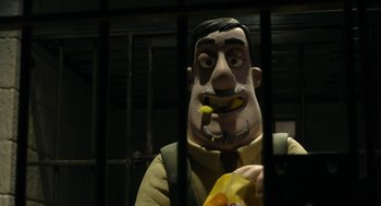 Movie still from “Shaun the Sheep Movie” (2015), directed by Mark Burton – A statue of a man in a jail cell; Close Up shot, Low angle