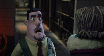 Movie still from “Shaun the Sheep Movie” (2015), directed by Mark Burton – A character in a cartoon style; Close Up shot, Over the shoulder angle