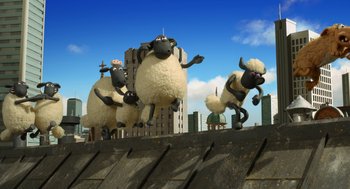 Movie still from “Shaun the Sheep Movie” (2015), directed by Mark Burton – A group of sheep jumping over a wall; Wide shot, Low angle