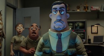 Movie still from “Shaun the Sheep Movie” (2015), directed by Mark Burton – A man in a suit and tie next to another man in a suit and tie; Close Up shot, Low angle