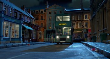 Movie still from “Shaun the Sheep Movie” (2015), directed by Mark Burton – A double decker bus driving down a street; Extreme Wide shot, High angle