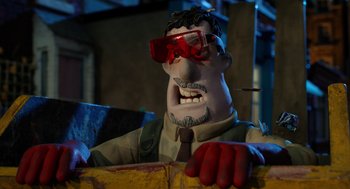 Movie still from “Shaun the Sheep Movie” (2015), directed by Mark Burton – A statue of a man with a beard wearing goggles; Close Up shot, Low angle