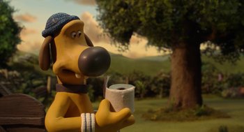 Movie still from “Shaun the Sheep Movie” (2015), directed by Mark Burton – A dog holding a cup of coffee; Close Up shot, Over the shoulder angle