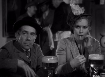 A man and a woman sitting next to each other
