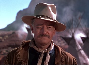 Movie still from “She Wore a Yellow Ribbon” (1949), directed by John Ford – A person wearing a hat; Close Up shot, Low angle