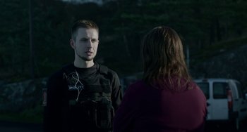 Movie still from “22 July” (2018), directed by Paul Greengrass – A man and a woman talking to each other outside; Medium shot, Over the shoulder angle