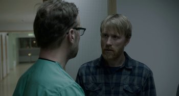 Movie still from “22 July” (2018), directed by Paul Greengrass – A man looking at himself in the mirror; Close Up shot, Over the shoulder angle