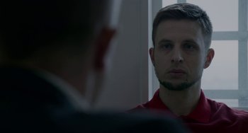 Movie still from “22 July” (2018), directed by Paul Greengrass – A man looking at himself in the mirror; Close Up shot, Over the shoulder angle