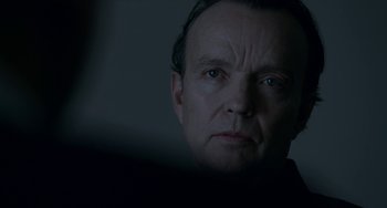 Movie still from “22 July” (2018), directed by Paul Greengrass – A person looking at the camera; Close Up shot, Over the shoulder angle