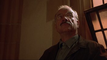 Movie still from “Shine” (1996), directed by Scott Hicks – An older man with glasses looking up at the ceiling; Close Up shot, Low angle