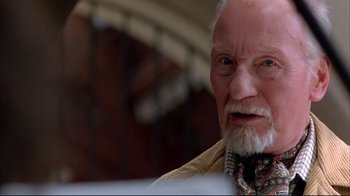 Movie still from “Shine” (1996), directed by Scott Hicks – An old man with a beard and a mustache; Close Up shot, Low angle