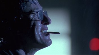 Movie still from “Shine” (1996), directed by Scott Hicks – A man's face with a cigarette in his mouth; Close Up shot, Low angle