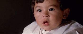 Movie still from “Shogun Assassin” (1980), directed by Kenji Misumi – A young child's face; Extreme Close Up shot, High angle