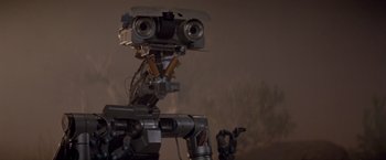 Movie still from “Short Circuit” (1986), directed by John Badham – The head of a robot; Close Up shot, Low angle