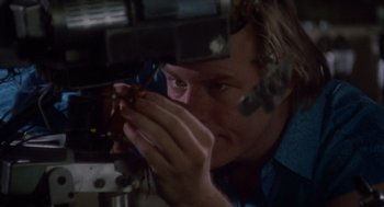 A man taking a picture with a camera