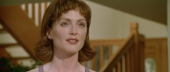 Movie still from “Short Cuts” (1993), directed by Robert Altman – A woman's face in a room; Close Up shot, Low angle