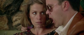 Movie still from “Short Cuts” (1993), directed by Robert Altman – A man and a woman looking at one another; Close Up shot, Over the shoulder angle