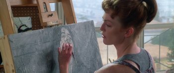 Movie still from “Short Cuts” (1993), directed by Robert Altman – A woman is painting a picture of a woman; Close Up shot, Low angle