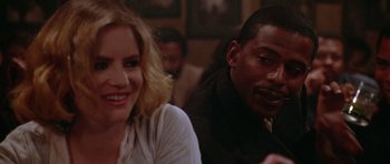 Movie still from “Short Cuts” (1993), directed by Robert Altman – A man and a woman sitting at a table in a restaurant; Close Up shot, Over the shoulder angle