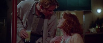 Movie still from “Short Cuts” (1993), directed by Robert Altman – A man and a woman talking to each other; Medium shot, Over the shoulder angle