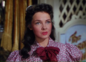 Movie still from “Show Boat” (1951), directed by George Sidney – A person wearing a dress; Close Up shot, High angle