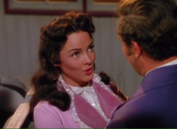 Movie still from “Show Boat” (1951), directed by George Sidney – A man and a woman talking to each other; Close Up shot, Over the shoulder angle