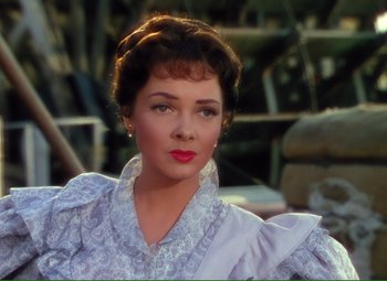 Movie still from “Show Boat” (1951), directed by George Sidney – A person wearing a dress; Close Up shot, Over the shoulder angle
