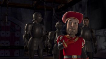 Movie still from “Shrek” (2001), directed by Vicky Jenson – A group of people in costumes in a room; Medium shot, Over the shoulder angle