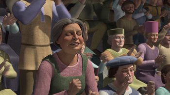 Movie still from “Shrek” (2001), directed by Vicky Jenson – A group of people that are sitting in a room; Medium shot, Low angle