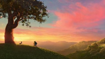Movie still from “Shrek” (2001), directed by Vicky Jenson – A person standing on top of a green hill under a tree; Extreme Wide shot, Low angle