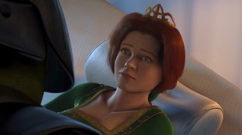 Movie still from “Shrek” (2001), directed by Vicky Jenson – A 3 - d image of a woman in a green dress with a crown; Close Up shot, High angle