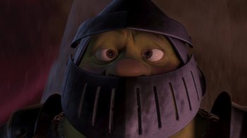 Movie still from “Shrek” (2001), directed by Vicky Jenson – A person wearing a helmet; Close Up shot, High angle