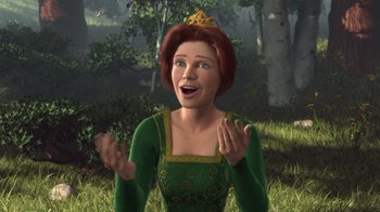 Movie still from “Shrek” (2001), directed by Vicky Jenson – An animated woman wearing a green dress and a crown; Medium shot, High angle