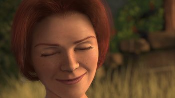 Movie still from “Shrek” (2001), directed by Vicky Jenson – A woman with red hair is smiling with her eyes closed; Extreme Close Up shot, Low angle