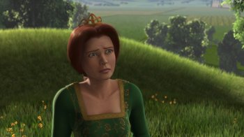 Movie still from “Shrek” (2001), directed by Vicky Jenson – An animated woman in a green dress with a crown on her head; Close Up shot, Over the shoulder angle
