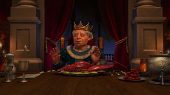 Movie still from “Shrek 2” (2004), directed by Andrew Adamson – An animated king sitting at a table with a plate of lobster; Medium shot, High angle