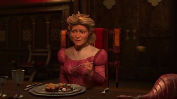 Movie still from “Shrek 2” (2004), directed by Andrew Adamson – A woman in a pink dress is sitting at a table with a plate of food in front of her; Medium shot, Over the shoulder angle