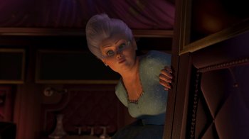 Movie still from “Shrek 2” (2004), directed by Andrew Adamson – A woman with white hair is looking over a railing; Medium shot, Low angle