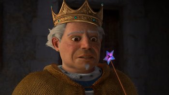 Movie still from “Shrek 2” (2004), directed by Andrew Adamson – An old man wearing a crown and holding a wand; Close Up shot, High angle