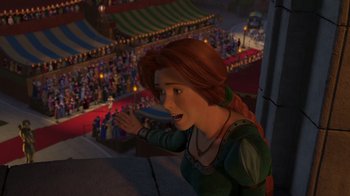 Movie still from “Shrek 2” (2004), directed by Andrew Adamson – An animation of a woman in a green dress waving at an audience; Wide shot, Over the shoulder angle