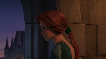 Movie still from “Shrek 2” (2004), directed by Andrew Adamson – A woman with red hair and a green bow in her hair; Medium shot, Over the shoulder angle