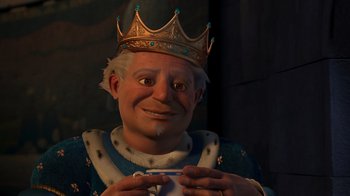 Movie still from “Shrek 2” (2004), directed by Andrew Adamson – An old man wearing a gold crown and holding something in his hand; Close Up shot, High angle