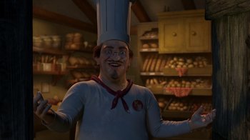 Movie still from “Shrek 2” (2004), directed by Andrew Adamson – A man wearing a chef's hat in a bakery; Medium shot, High angle