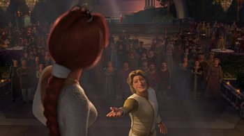 Movie still from “Shrek 2” (2004), directed by Andrew Adamson – Two women are standing in front of a crowd of people; Wide shot, Over the shoulder angle