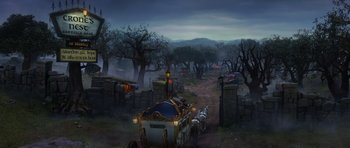 Movie still from “Shrek Forever After” (2010), directed by Mike Mitchell – An image of an old fashioned carriage going down the road; Extreme Wide shot, High angle