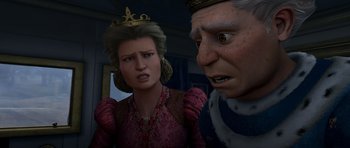 Movie still from “Shrek Forever After” (2010), directed by Mike Mitchell – An old man and a young woman are looking at each other; Medium shot, Over the shoulder angle